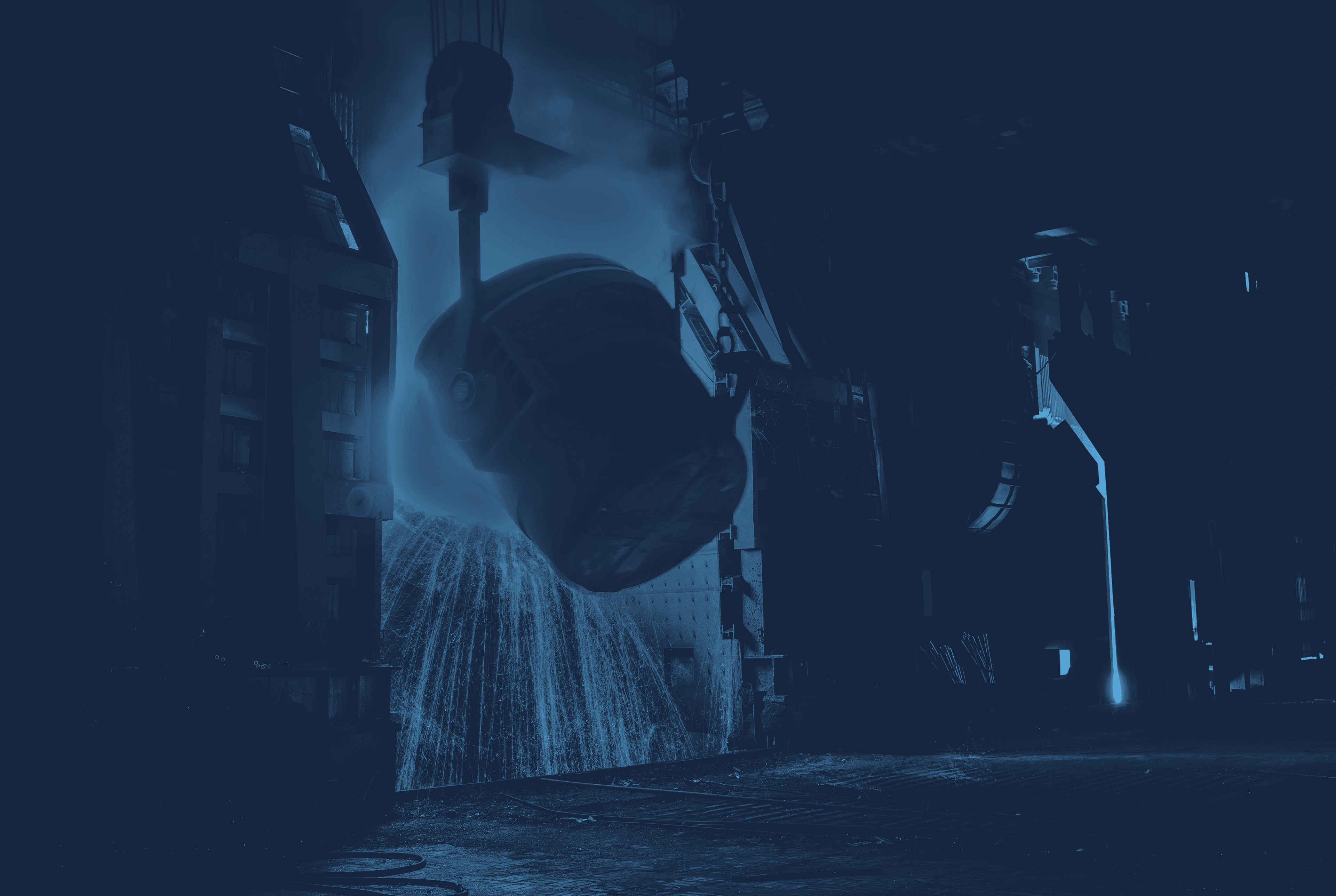 Darkened image of a steel mill in action