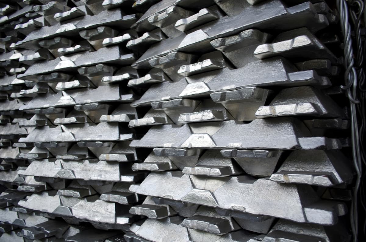 Aluminium ingots stacked in a warehouse